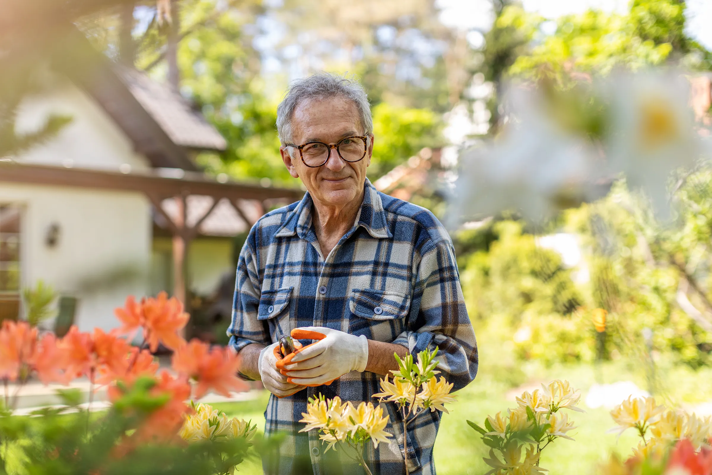 senior man gardening outside