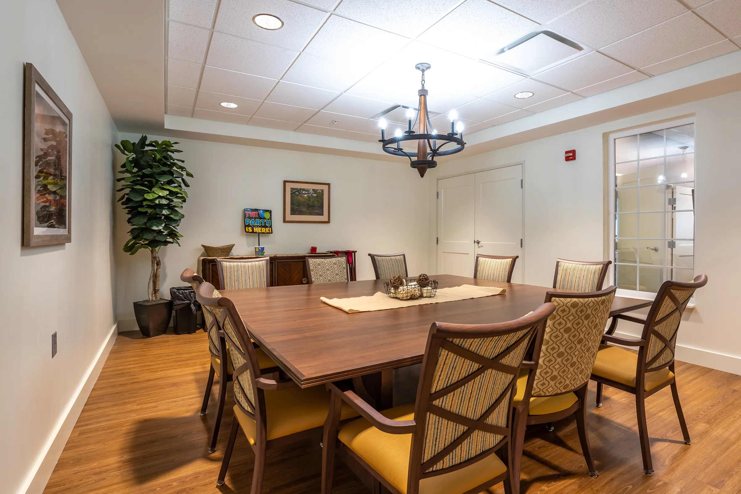 Image of private dining room with large table at assisted living community