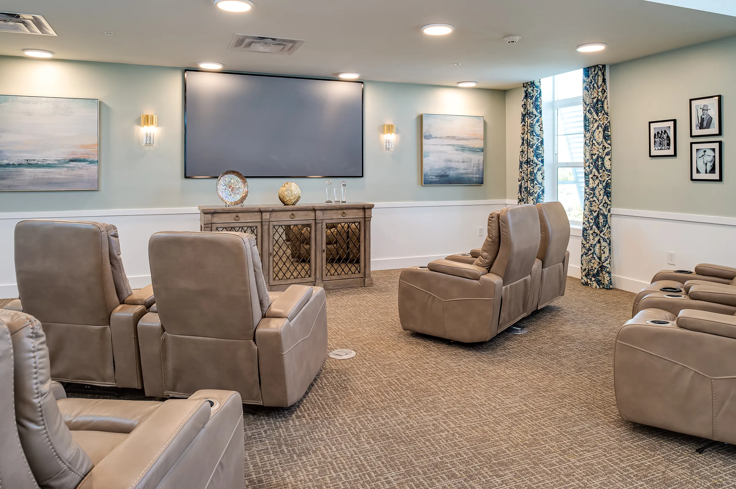 movie theatre room with leather recliners