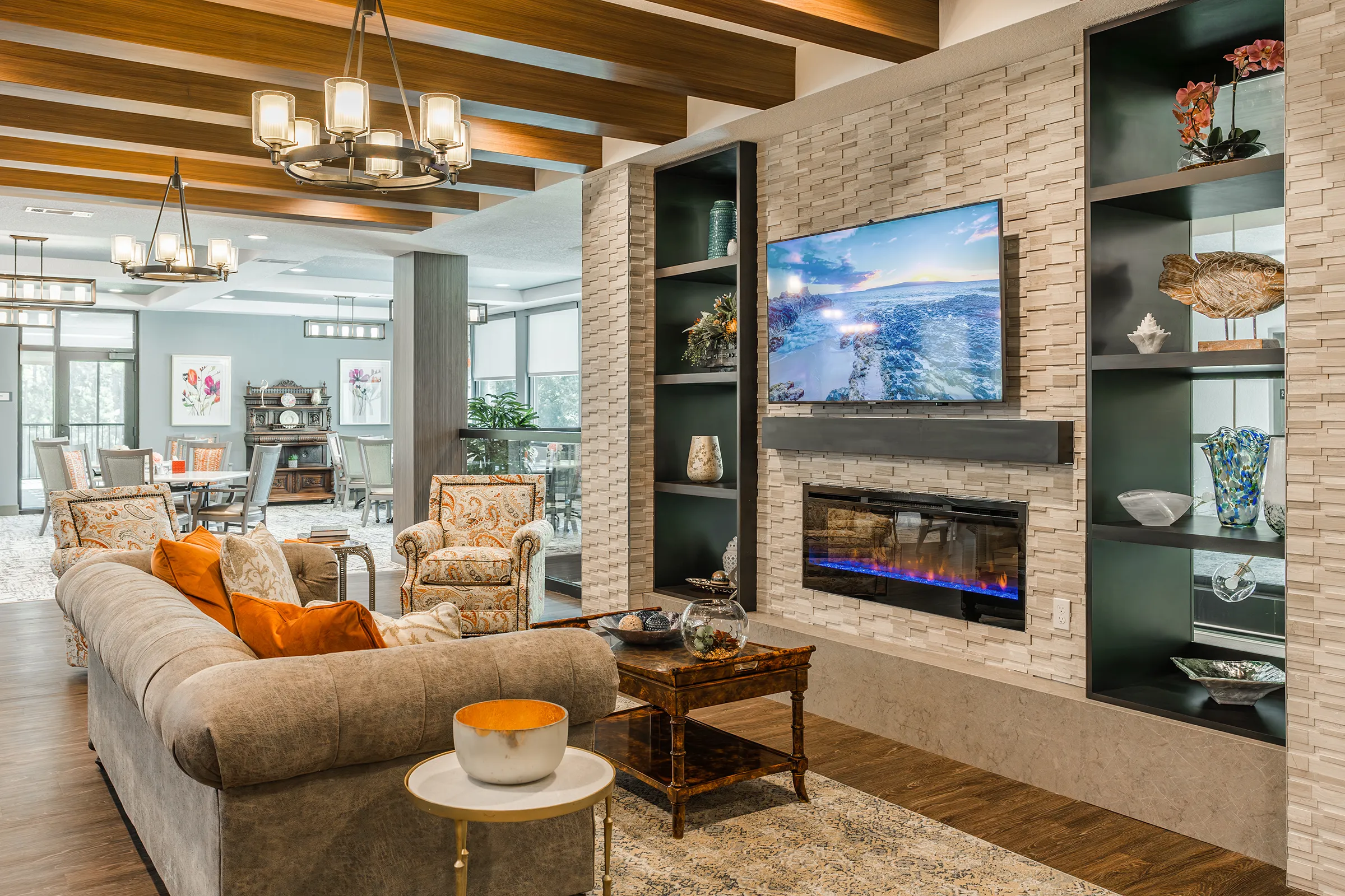 sitting area with fireplace and television