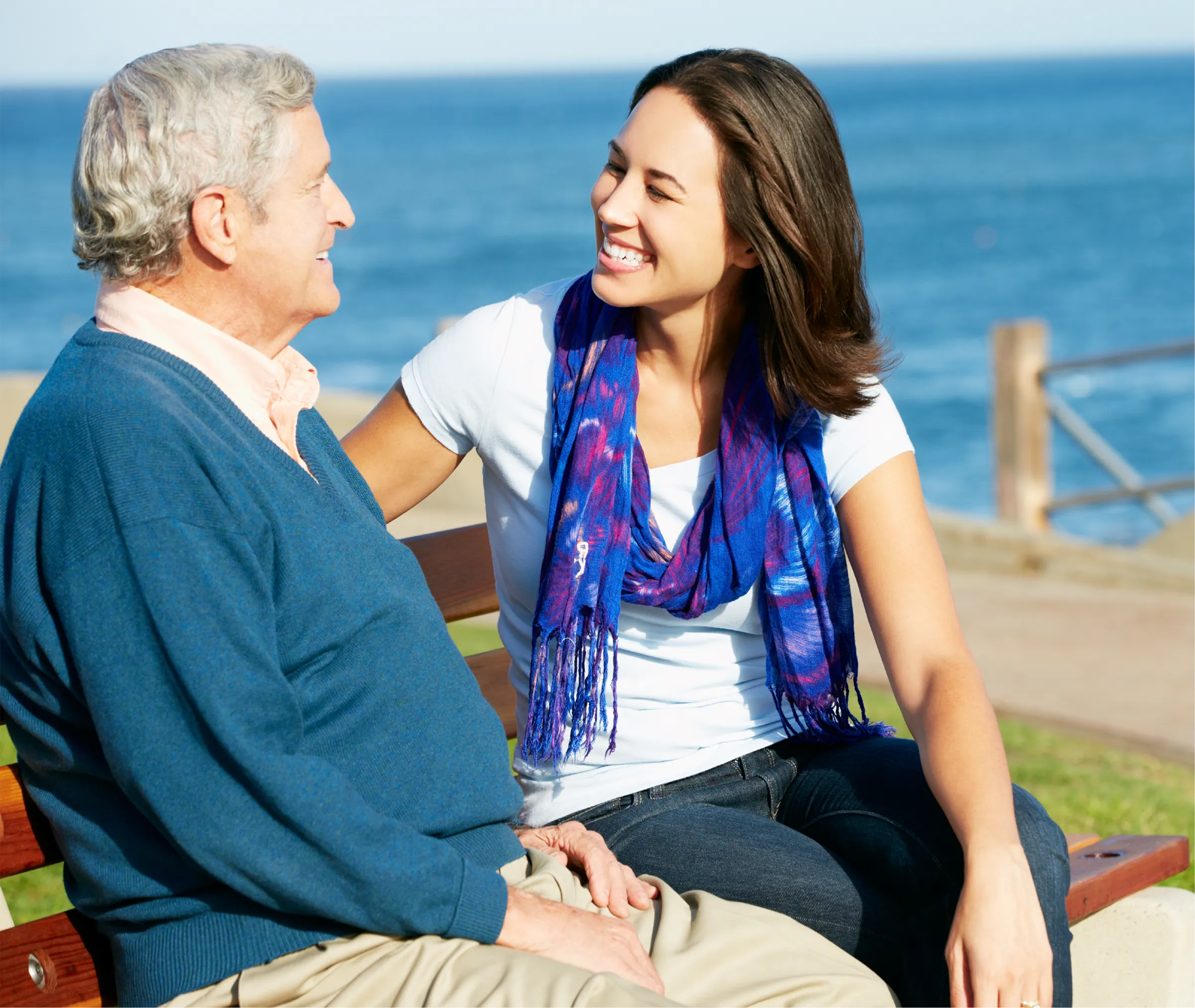 man on beach with woman memory care provider